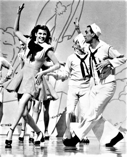 映画「今宵よ永遠に」（1945年）で、リタ・ヘイワース（左）と踊るジャック・コール