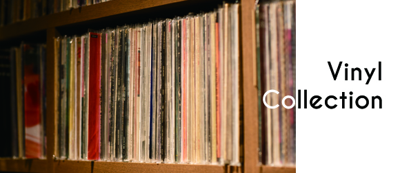 壁一面にぎっしりと納められたレコードの数々。60〜70年代のアメリカンロックを中心に、ジャズやソウルまで5,000枚以上が並ぶ。