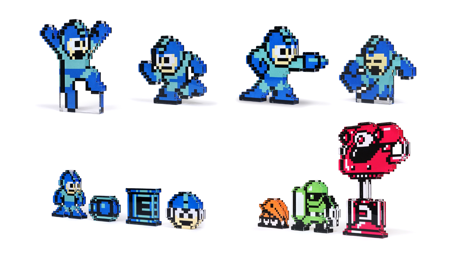 アクリルフィギュア　単体各1,430円（税込） ／ロックマン&アイテムセット 2,970円（税込）／敵キャラセット 2,970円（税込）  「ドット絵時代の創意工夫」コーナーで展示されているロックマンたちのドット絵のアクリル。ロックマンのモーション別単体4種、ロックマンとアイテム・敵キャラセットの2種（C）CAPCOM