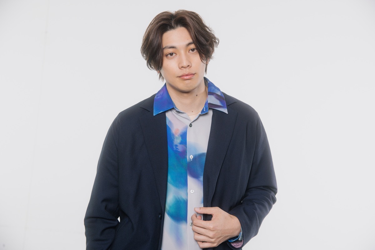 東啓介