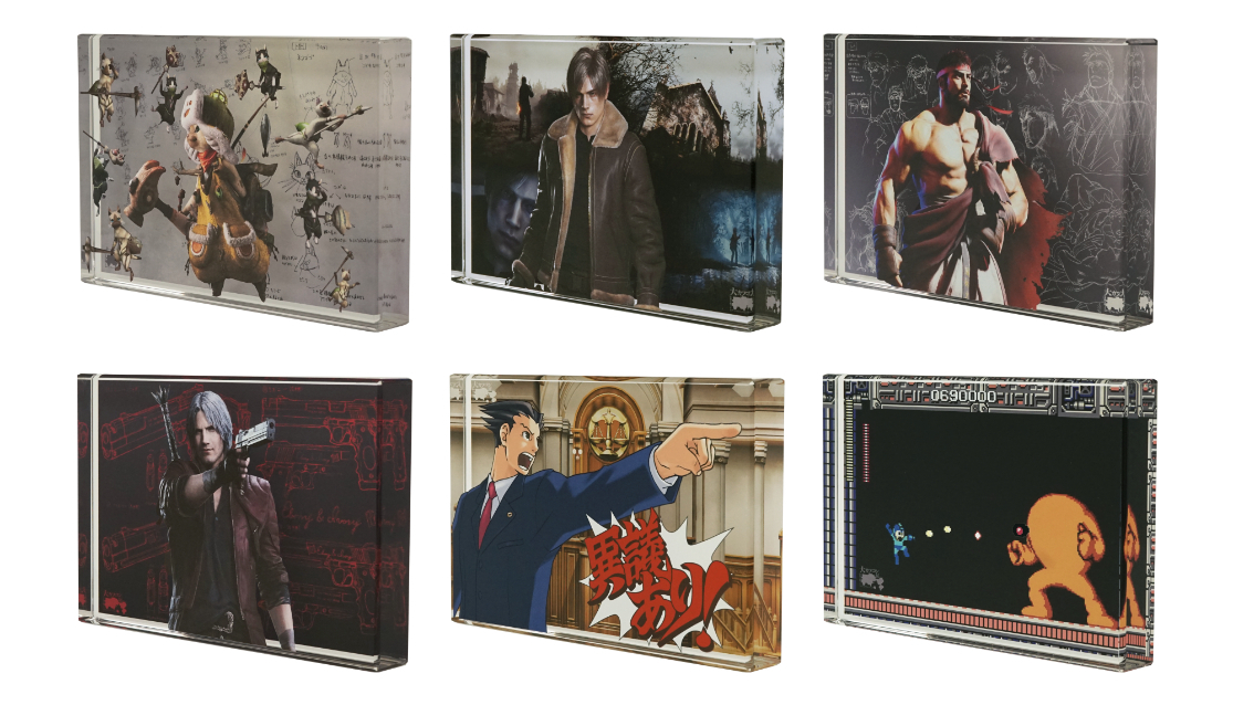 『大カプコン展-世界を魅了するゲームクリエイション』　アクリルブロック 全6種　各3,960円（税込）   『モンスターハンター』『バイオハザード』『ストリートファイター』『デビル メイ クライ』『逆転裁判』『ロックマン』の全6種。サイズ：横 151mm×縦101mm ×厚み20mm（C）CAPCOM