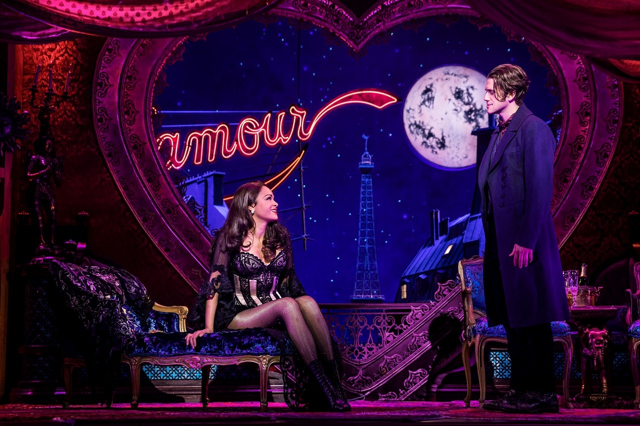 Karen Olivo as Satine and Aaron Tveit as Christian