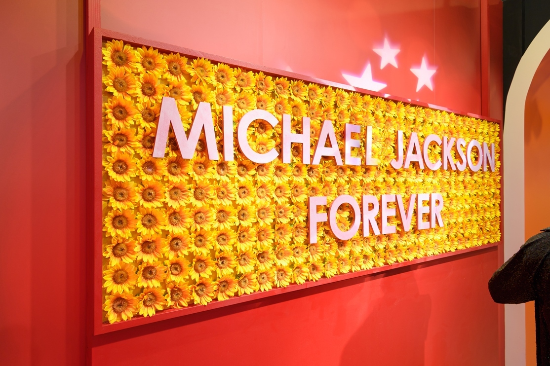 The images shown depict wax figures created and owned by Madame Tussauds.