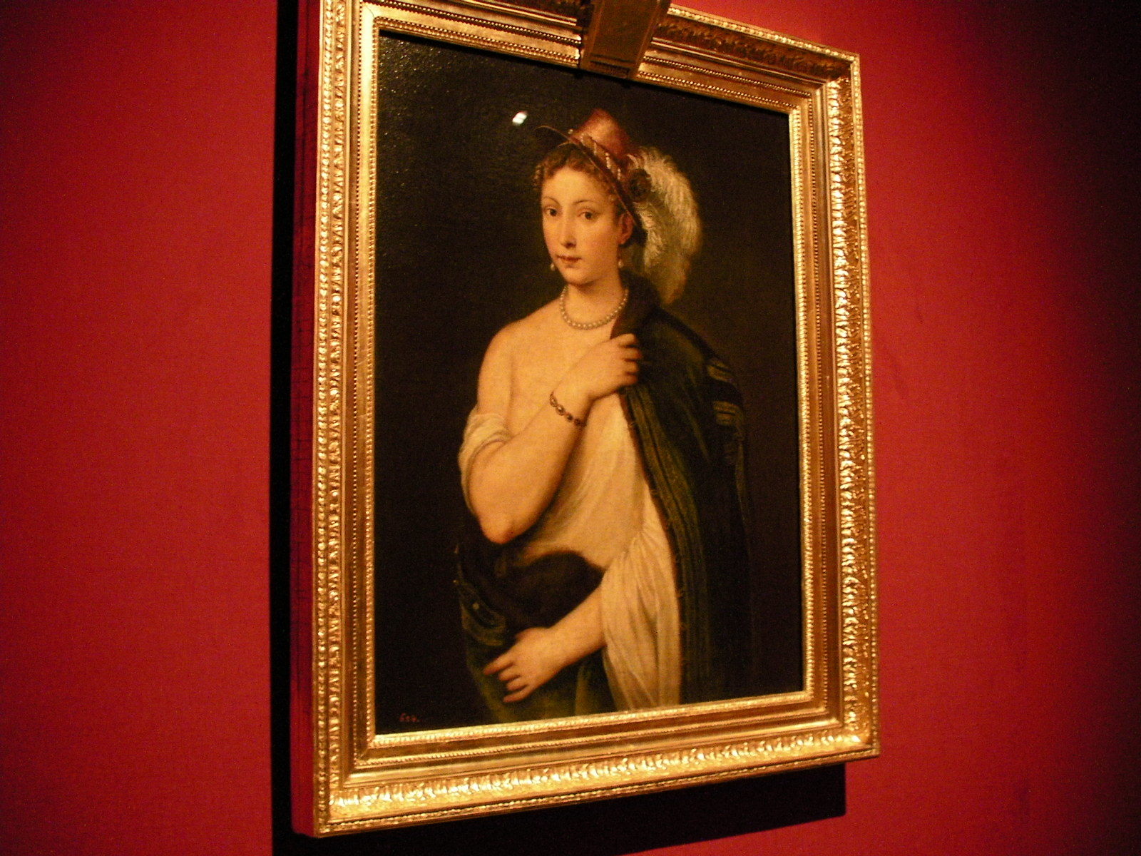 ティツィアーノ・ヴェチェッリオ《羽根飾りのある帽子をかぶった若い女性の肖像》（1538）