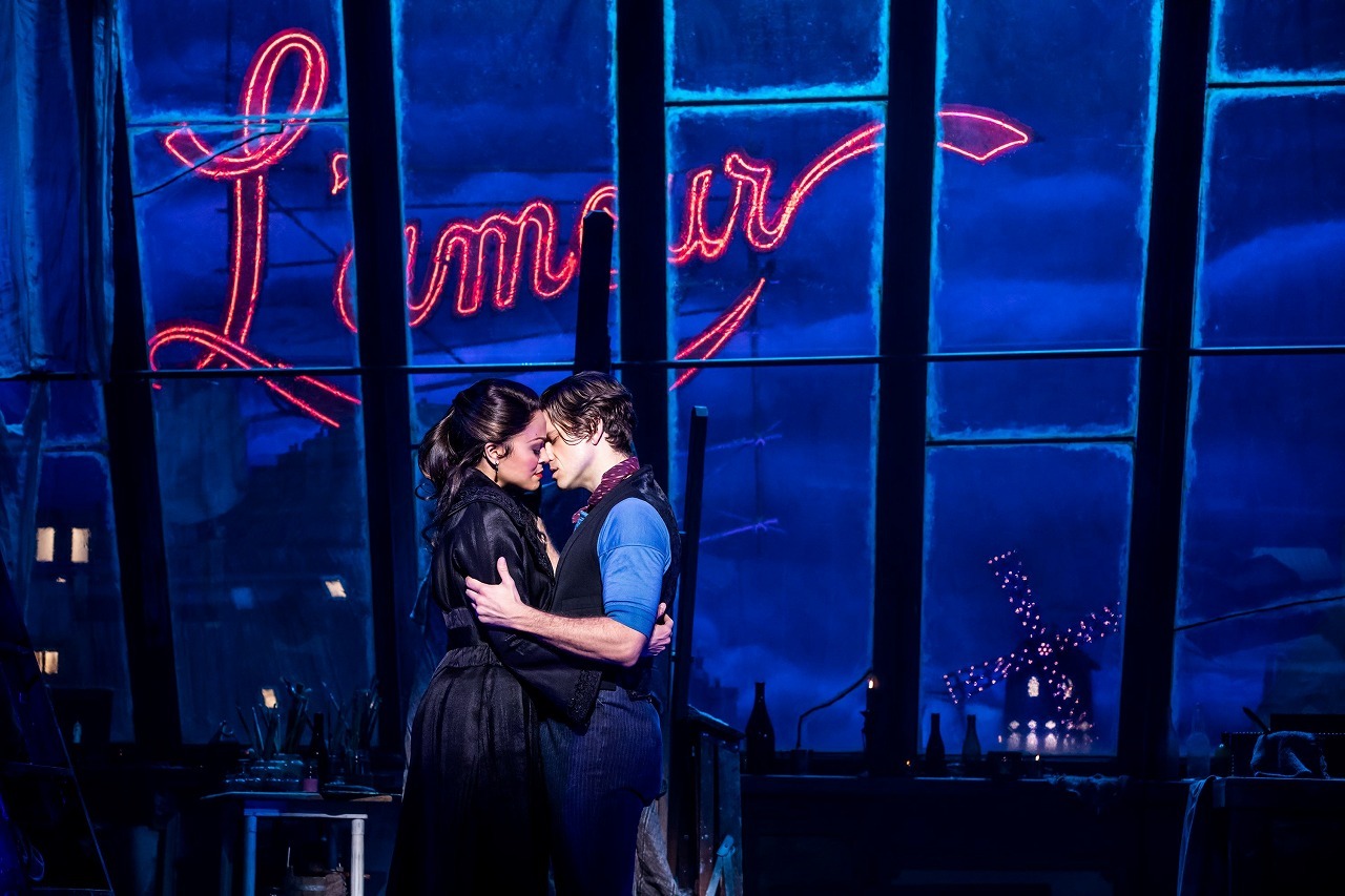 Karen Olivo as Satine and Aaron Tveit as Christian