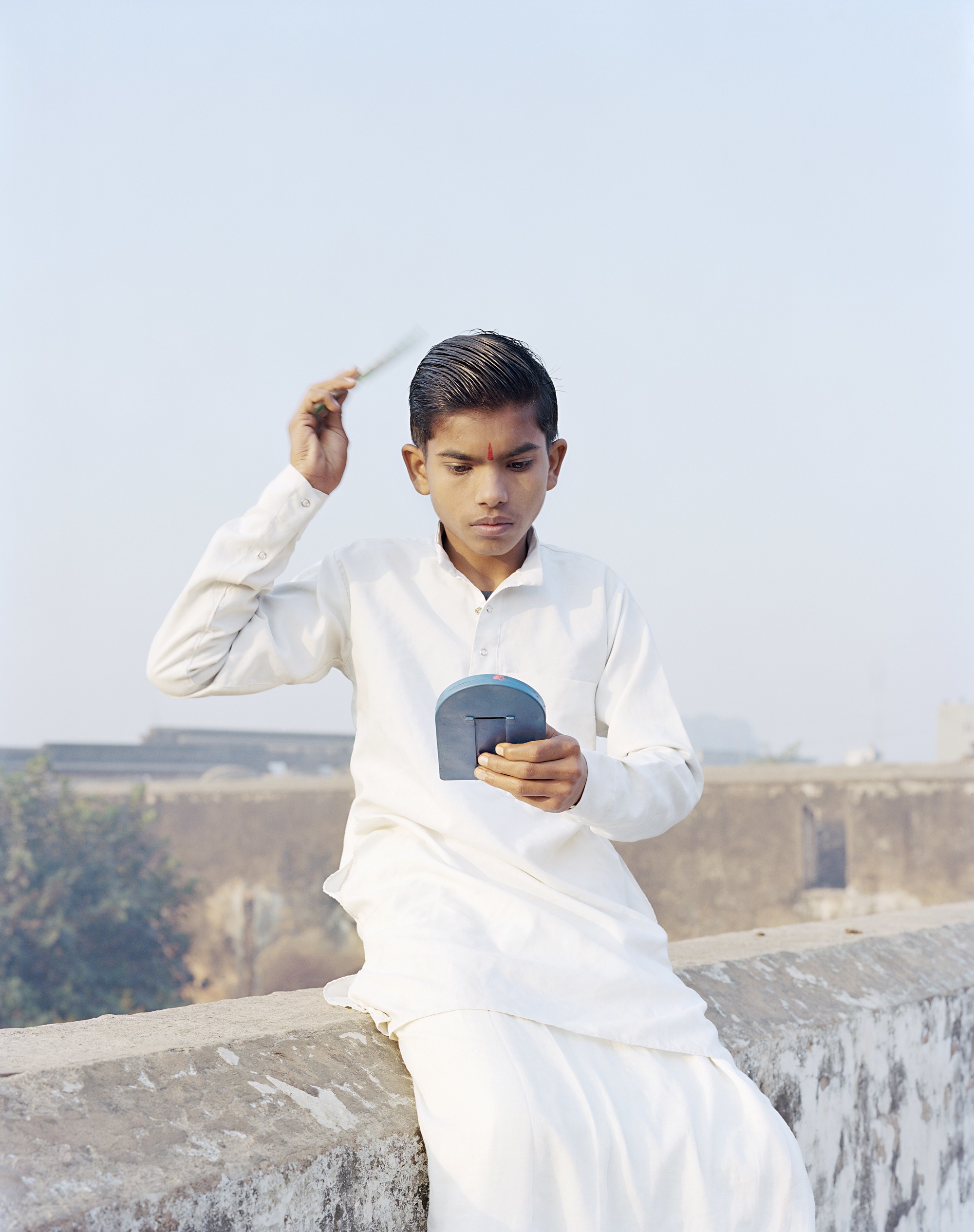 Rama Combing His Hair, Ayodhya, India, 2015 (C)Vasantha Yogananthan