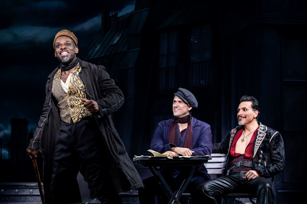 Sahr Ngaujah as Toulouse Lautrec, Aaron Tveit as Christian and Ricky Rojas as Santiago